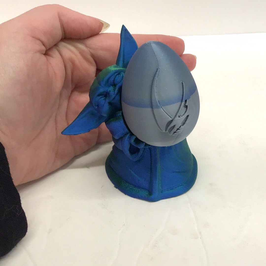 The Child Egg Holder W/ Mud Horn Egg